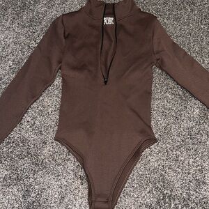 Long sleeve body suit